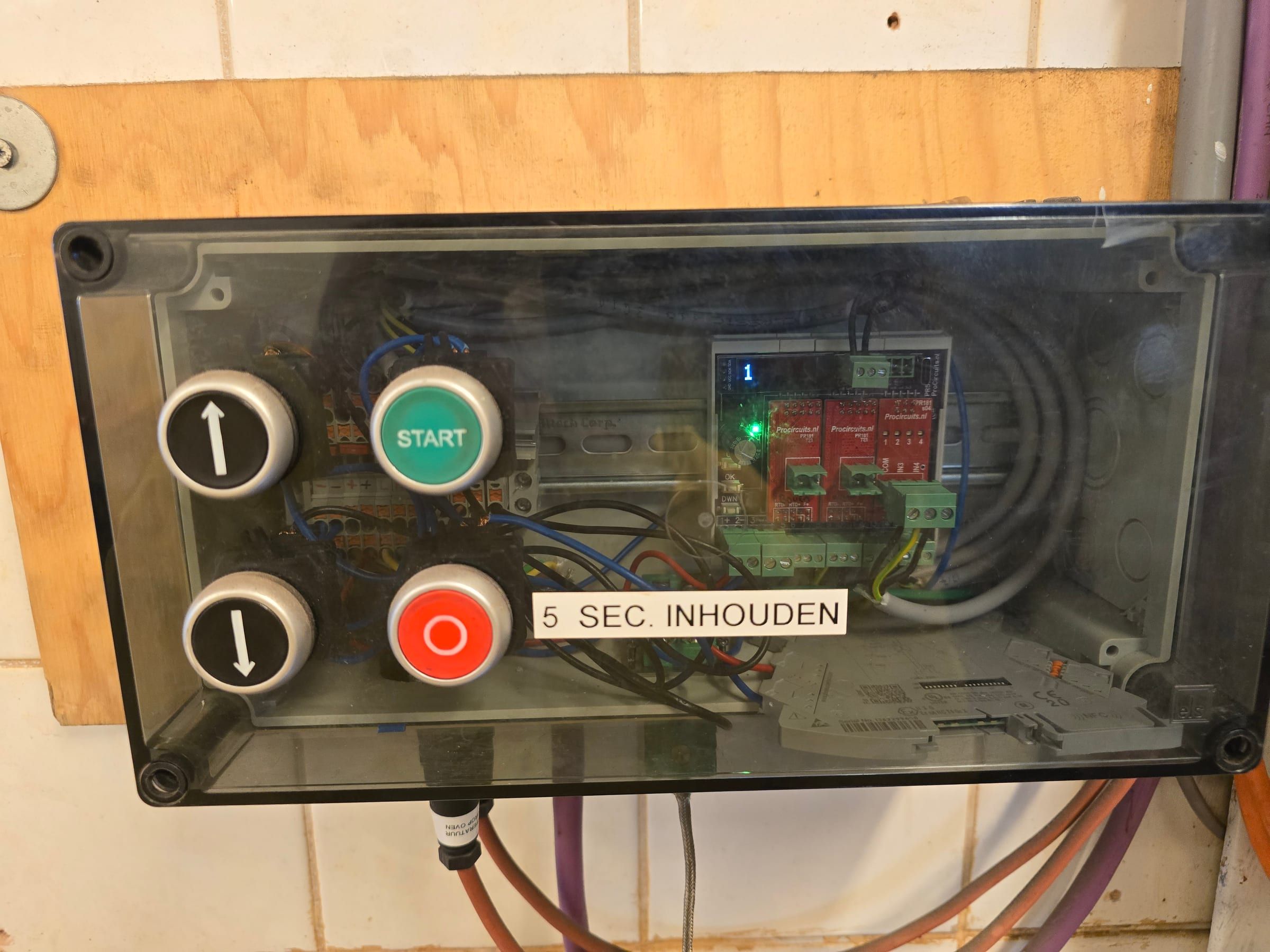 Transparent industrial enclosure with start and stop button