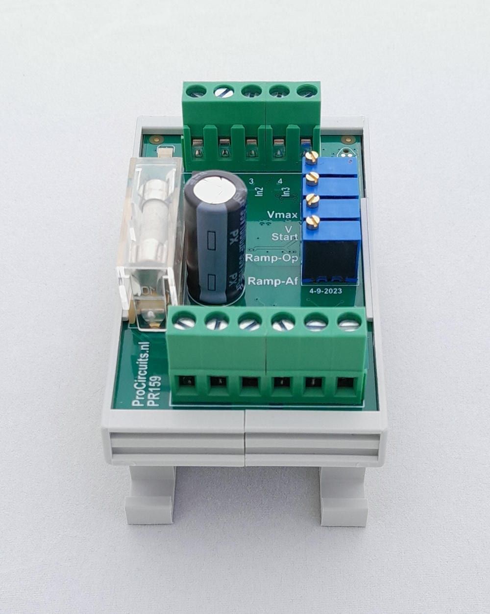 PR159 module in DIN rail enclosure, front view with the V-max, V-start, Ramp-up and Ramp-down trimmers