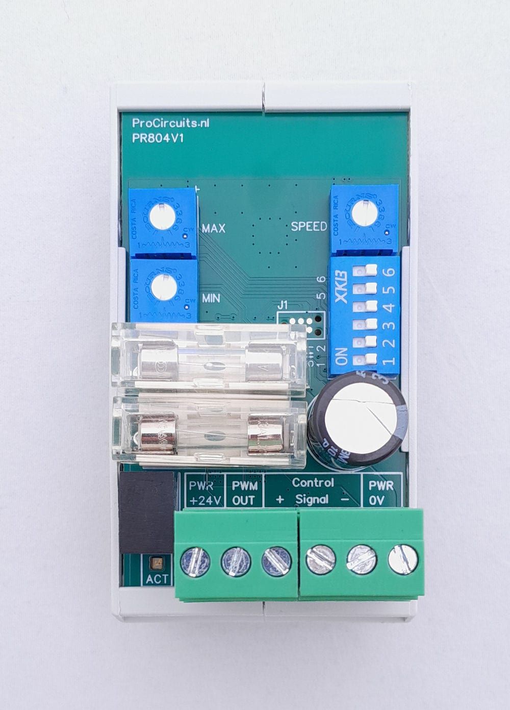 PR804-module van boven: trimmers MIN, MAX en SPEED, DIP-schakelaar en zes schroefklemmen